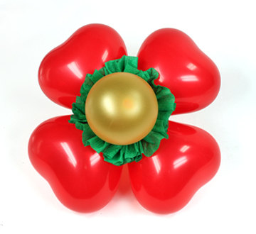 Decoración con globos: una flor navideña - Revista - Fiestafacil