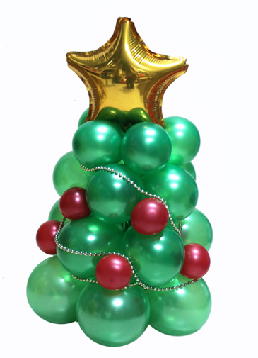 Decoración con globos: un pequeño árbol de Navidad - Revista - Fiestafacil